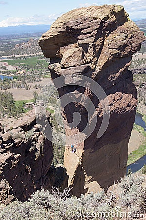 Climbers on the overhanging cliff of Monkey Face