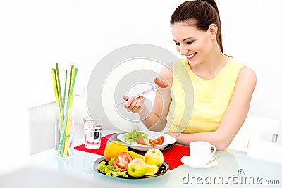 Close-up Of Beautiful Woman Eating healthy food