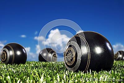 Close up of bowling balls on a bowling field