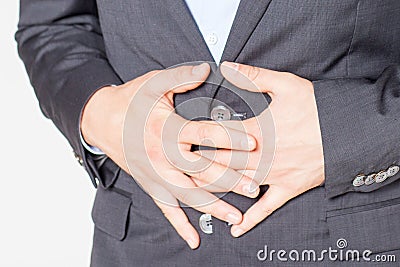 Close-up of businessman with strong stomach pain