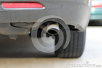 Close up of a car exhaust muffler