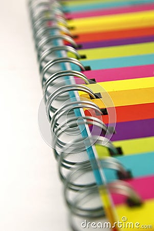 Close up of colorful notebook spiral binding