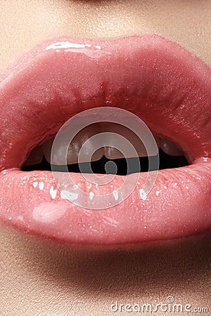 Close-up of fashion lips makeup in sweet kiss