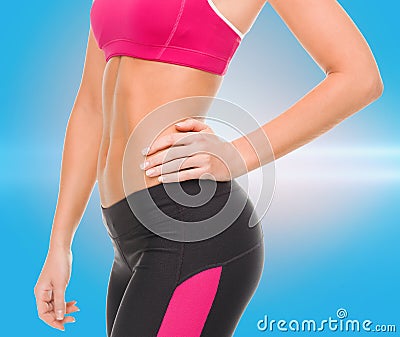 Close up of female abs in sportswear