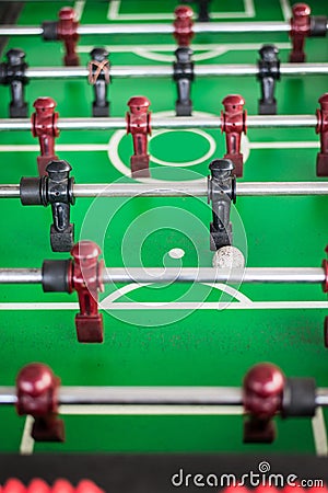 Close up of a foosball game