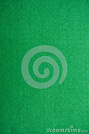 Close-up of green poker table felt background