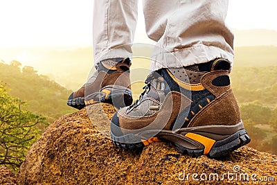 Close up of hiker boots on rocks.