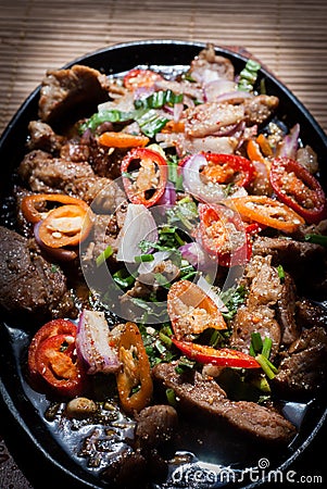 Close up Hot pan pork with tamarine chilil sauce.