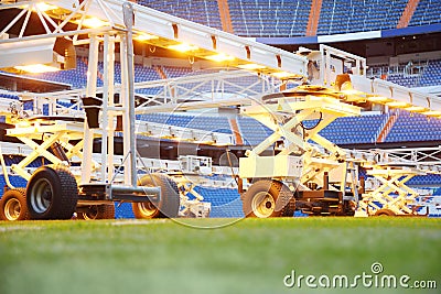 Close up of lighting system for growing grass at stadium