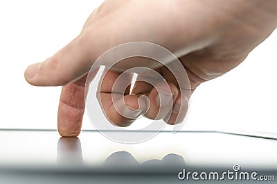 Close up of male hand using a touch screen device