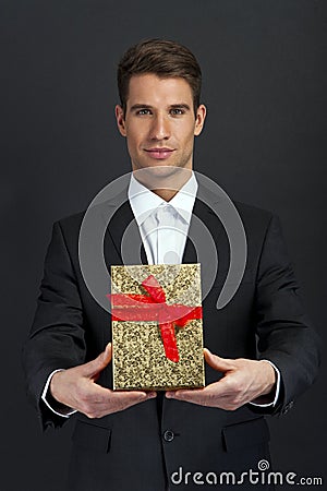Close up of man hands holding gift box