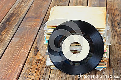 Close up of old record and records stack pic