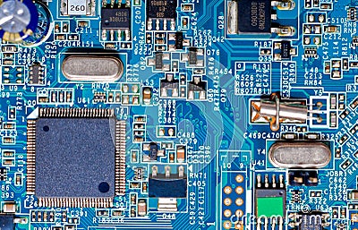 Close-up photograph of a blue circuit board