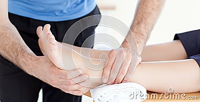 Close up of a physio doing a foot massage
