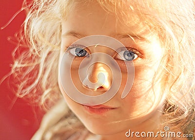 Close up portrait of five years old blond child girl