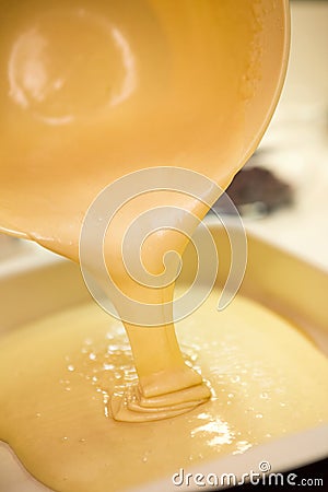 Close up of pouring cake mixture