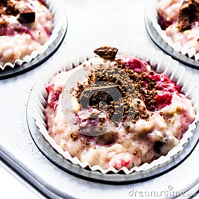 Close up of Raw muffin batter in a baking tin ready for baking