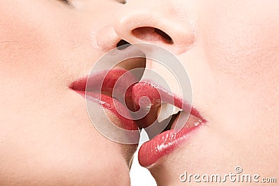 Close up of red kissing female lips