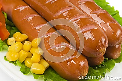 Close up of sausage and fresh vegetables