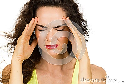 Close-up of woman with bad headache