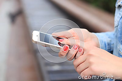 Close up of a woman using mobile