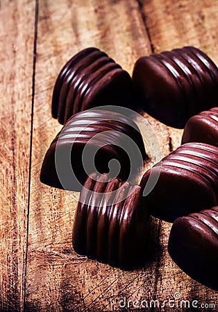 Closeup brown chocolate candy background. Chocolate truffles on