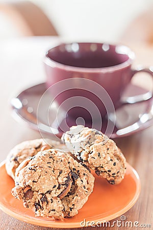 Closeup cereal cookies on orange plate