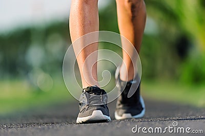 Closeup of feet on pathway