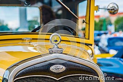 Closeup frontal view of a vintage Ford car