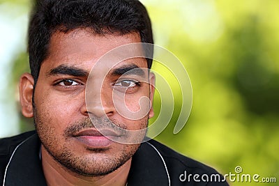 Closeup of Handsome middle-aged Indian/asian youth