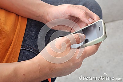 Closeup of Man s Hand Touching Screen of Smartphone