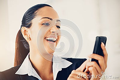 Closeup portrait of beautiful Indian businesswoman sending text