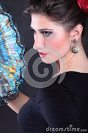 Closeup portrait of flamenco dancer fan