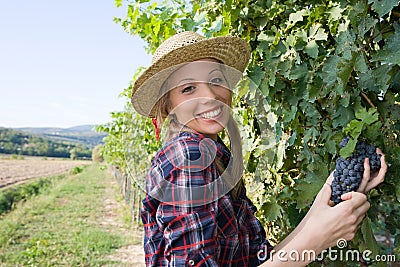 Closeup portrait of a happy young peasant woman