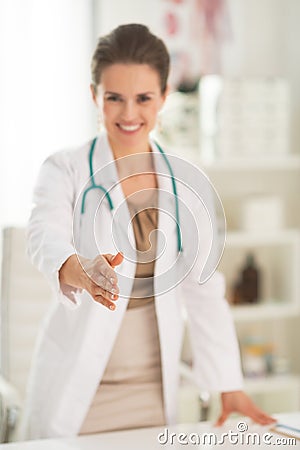 Closeup on smiling medical doctor woman in office