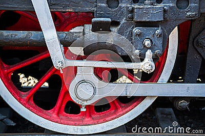 Closeup view of steam locomotive wheels, drives, rods, links and