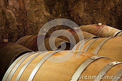 Closeup of Wine Barrels in a Wine Cellar