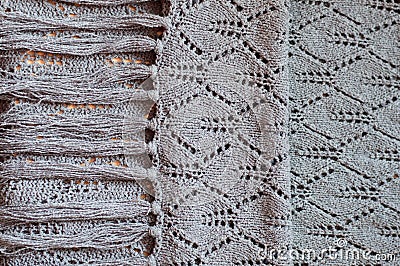 Closeup on woven handmade knitting grey sweater