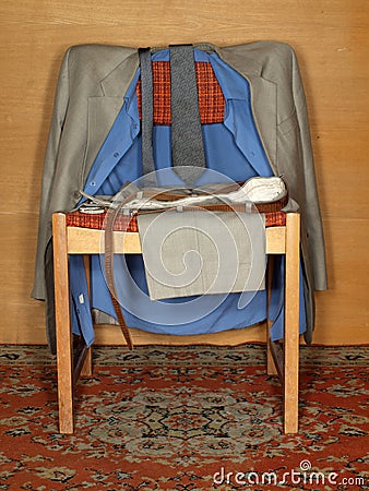 Clothes hanging on an old chair