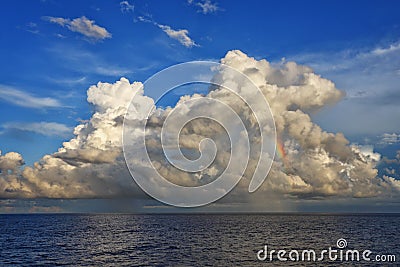 Clouds and rainbow