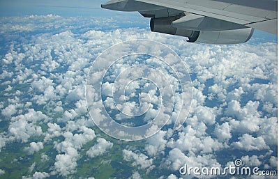 Clouds under the plane wing