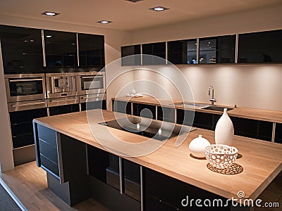 Tatiana doria: cocina en negro y madera