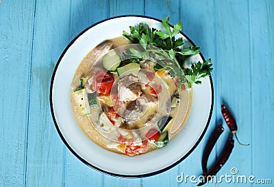 Coconut fish chowder with tuna, salmon and fresh vegetables
