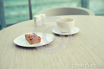 Coffee and cake on table