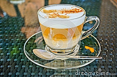 Coffee cappuccino in a glass cup. HDR picture