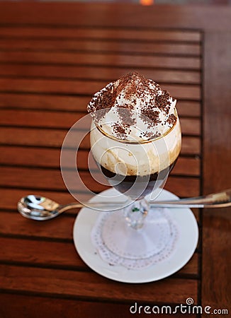 Coffee drink with cream and chocolate coating