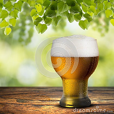 Cold beer on wood table