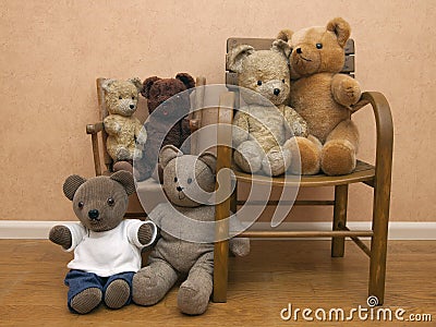 Collection of teddy bears on children s chair