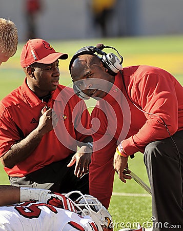 College football - coach with injured player