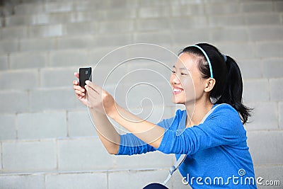 College student take photo with phone
